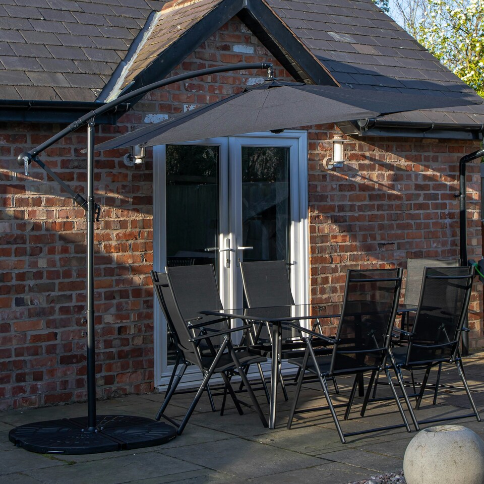 image 1 of Outdoor 6 Person Rectangular Glass Top Garden Dining Table Chairs With Black Banana Parasol and Base