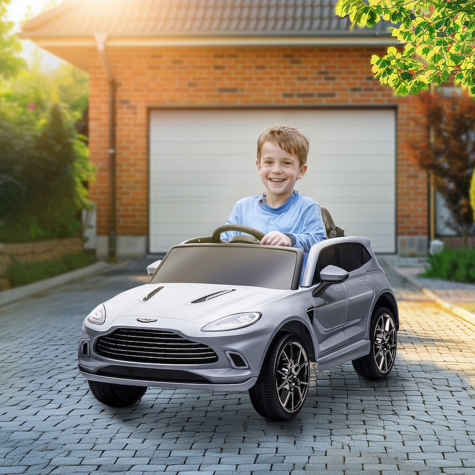 image 1 of AIYAPLAY 12V Kids Electric Car, Aston Martin DBX Licensed Kids Ride on Car with Remote Control, 4 Suspension Wheels, LED Lights, Music, Horn, Slow Start, for Ages 3-6 Years, Grey