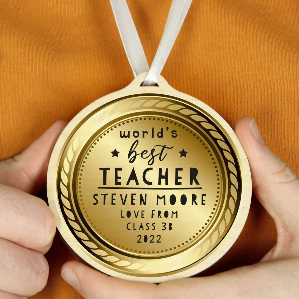 image 1 of Personalised WorldÂ’s Best Teacher Round Wooden Medal