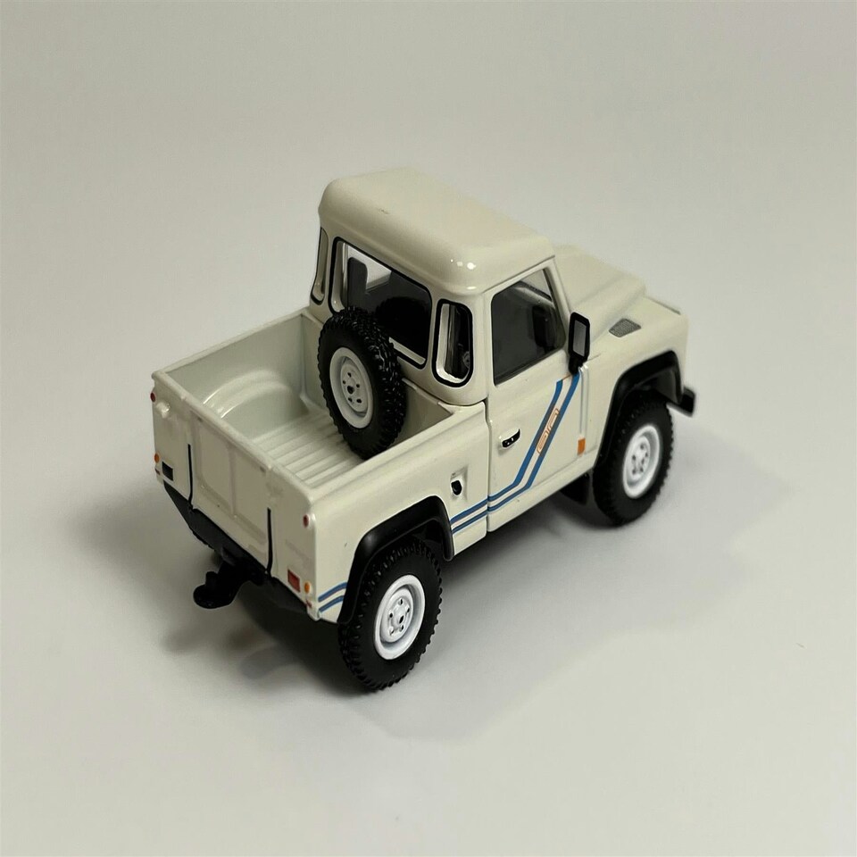 image 1 of Land Rover Defender 90 Pick Up White 1:64 Scale Mini GT MGT00338L