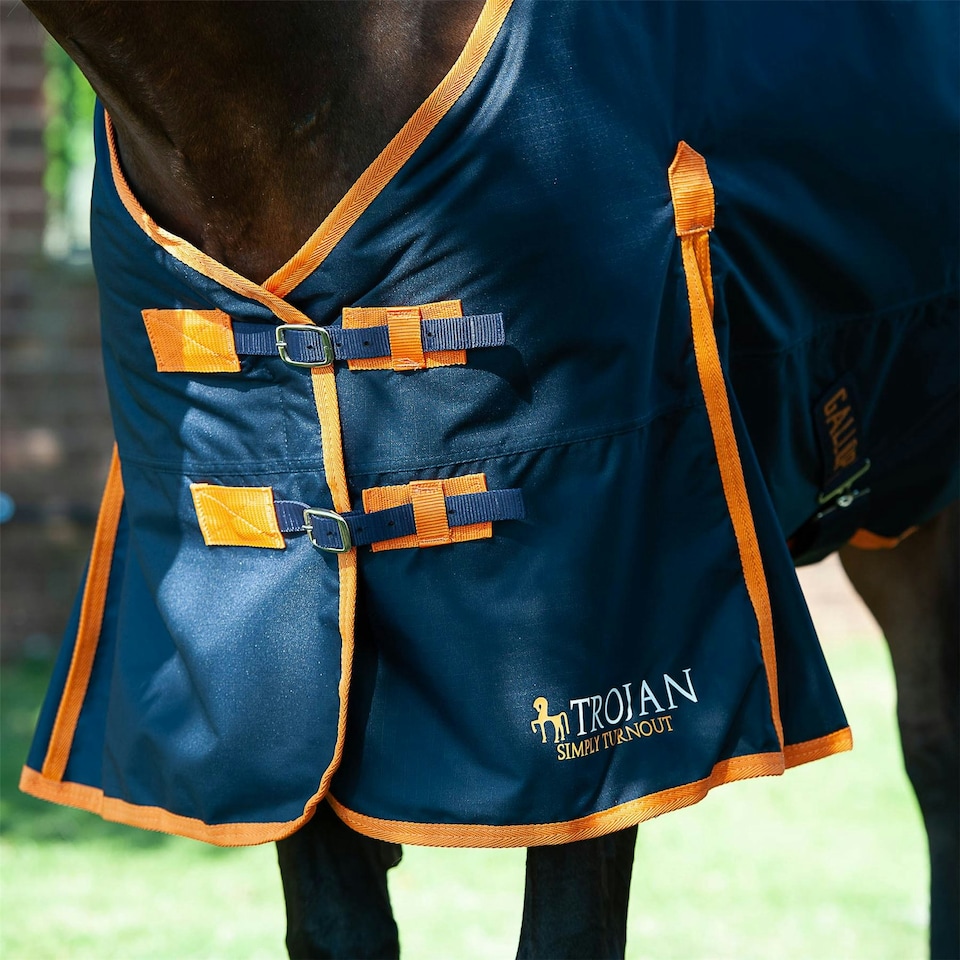 image 1 of Gallop Equestrian Trojan 100 Standard Turnout Red | Size: 5ft 9
Colour: Navy/Red