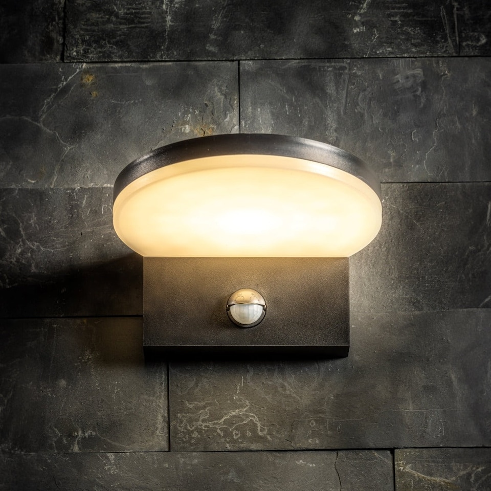 image 1 of CGC Lighting Aubrey 10W Black LED Outdoor Wall Light with PIR 4000K IP54 | Black | Black | Height 8.2cm, Width 14.2cm, Depth 26cm