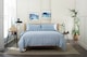 image 1 of Small Fish  Cotton Duvet Set with Stripe Reverse & Printed Fabric Bag | Multi | Super King