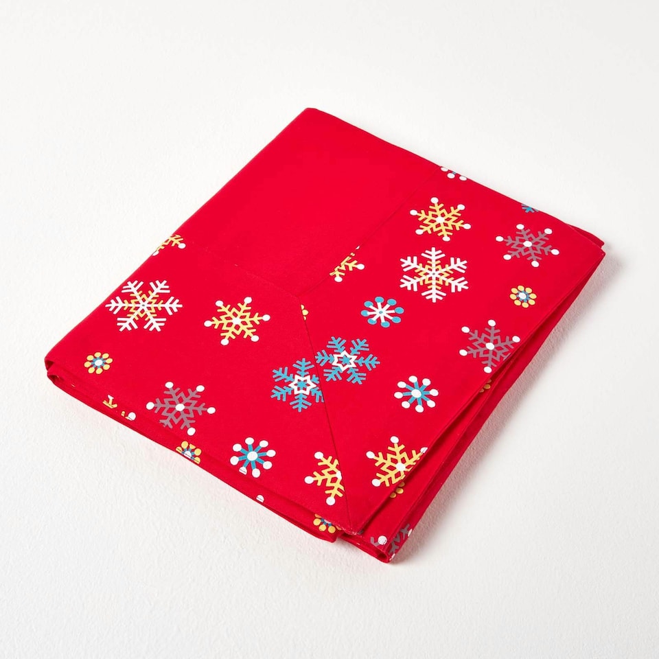 image 1 of Homescapes Cotton Christmas Red Snowflake Border Tablecloth - 137 x 228 cm | Red | 137cm x 228cm (54" x 90")