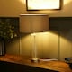 image 1 of ValueLights Clear Tube and Brushed Chrome Metal Bedside Table Lamp with a Grey Velvet Shade - LED Bulb Included