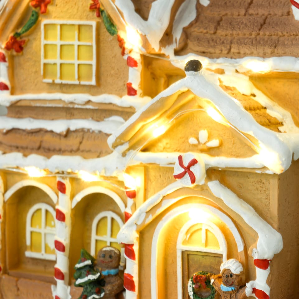 image 1 of HOMCOM Christmas Village Gingerbread House with LED Lights and Music, Lighted and Musical Christmas Candy House with Gingerbread Man, Battery Operated, Brown