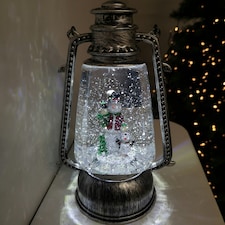 24cm Christmas Water Spinner Antique Silver Effect Hurricane Lantern Style with Snowman & Penguin Scene