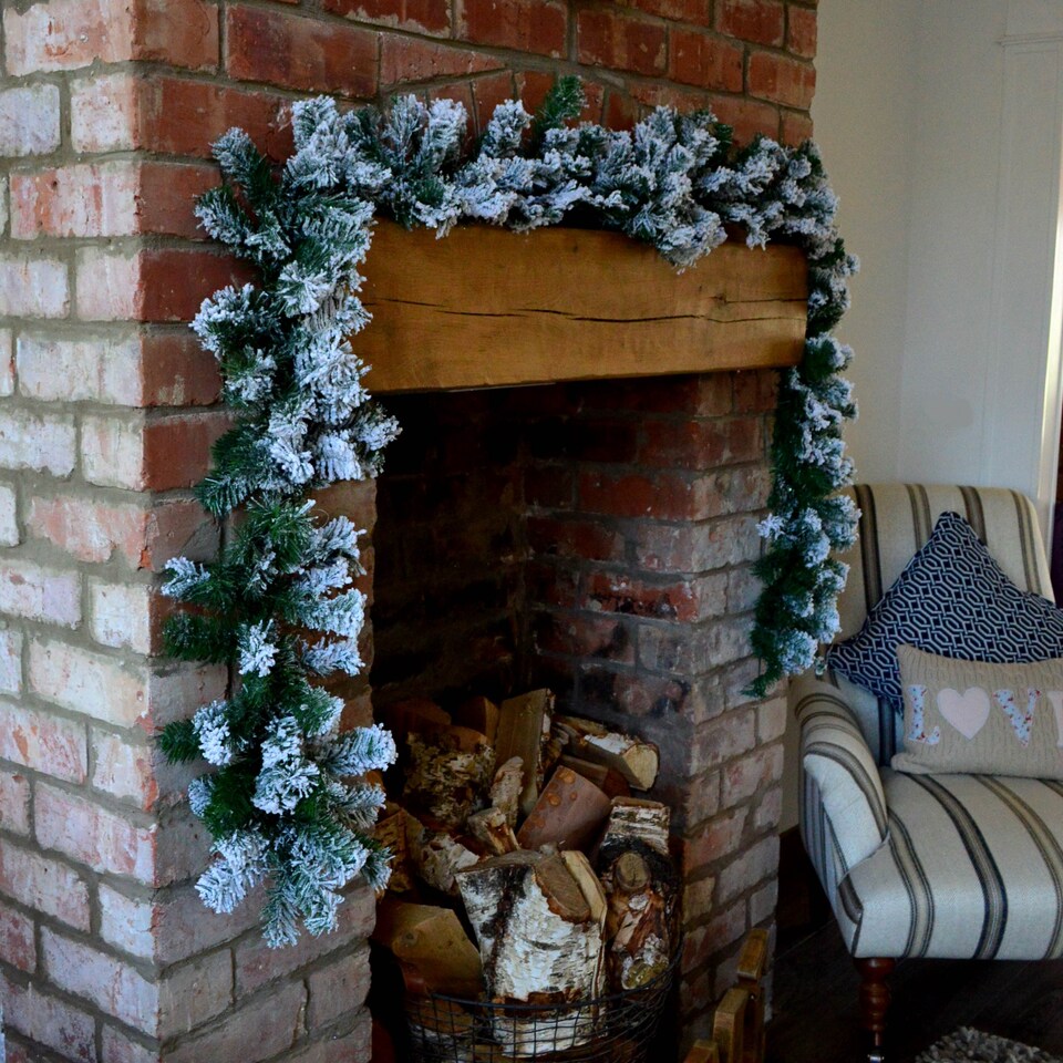 image 1 of Premier 2.7m Snow Flocked Pine Christmas Garland with Glitter Finish