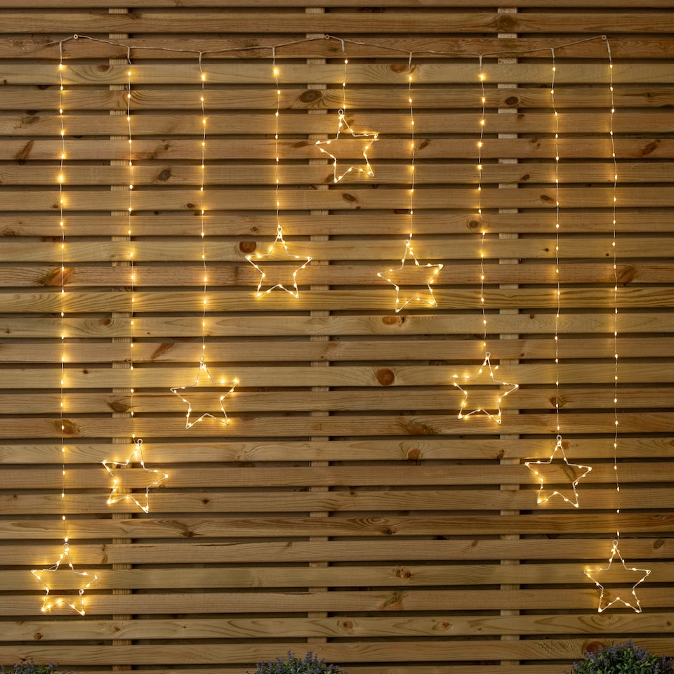image 1 of 1.2m Premier Christmas Static Star LED Silver Pin Wire V Curtain Lights in Warm White
