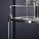image 2 of Interiors by Premier Round Drinks Trolley, Two‑Tier Glass Shelves with Acrylic Supports, Mid‑Century Stainless Steel Bar Cart Black