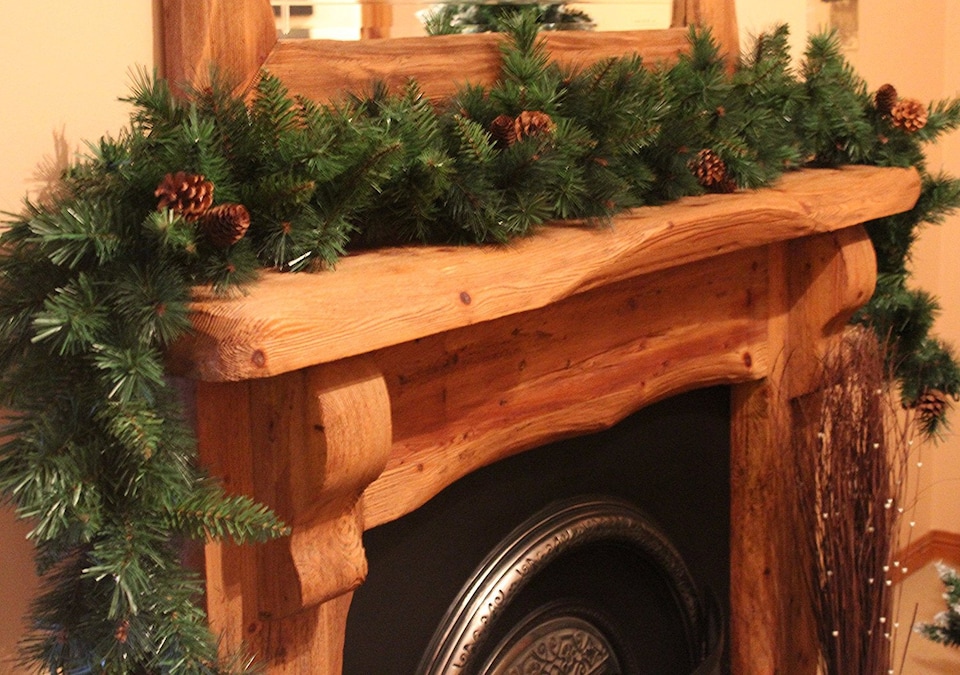 image 1 of Best Artificial 12ft Colorado Pine Christmas Garland with Pine Cones with 100 warm white battery lights