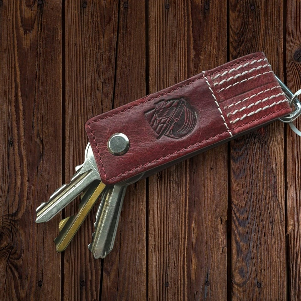 image 1 of CRICKET-GIFTS - Buffalo Leather Screw Key Chain | Luxurious & Durable | Ideal for Cricket Enthusiasts | Secure & Elegant Metal Clasp