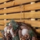 image 8 of 50cm Frosted Hanging Christmas Wreath with Pine Cones & Wooden Stars