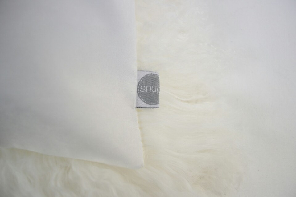 image 1 of SNUGRUGS Mongolian Sheepskin Cushion - Rectangular - 30cm x 50cm | White | 30 x 50cm