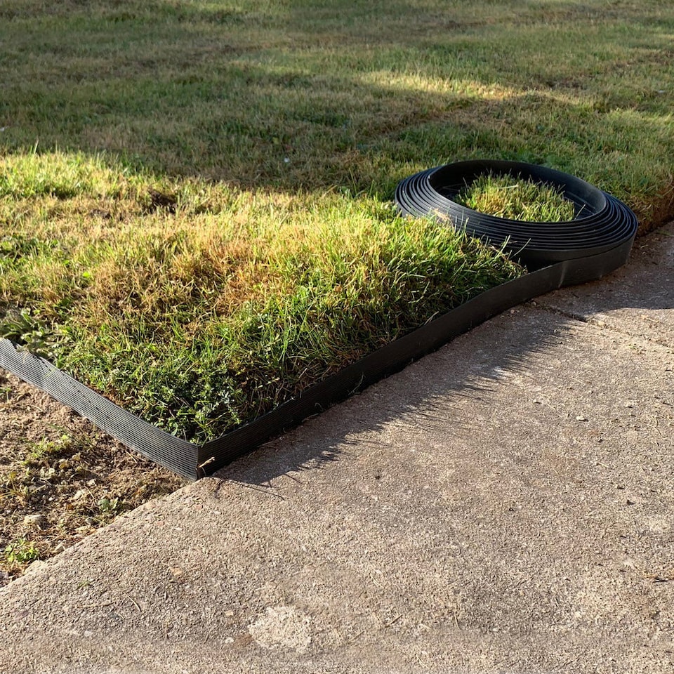 image 1 of Flexible Black Plastic Garden Lawn Edging with 40 Pegs (10m) - 3 Rolls