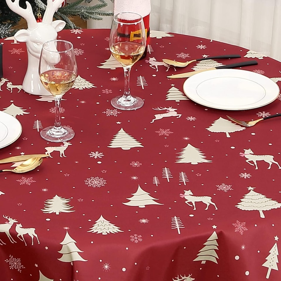 image 1 of London Boutique Round Christmas Tablecloth, Waterproof Washable, Deer Festive Print, Red‑Gold, 60 x 60 in