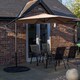 image 1 of Outdoor 4 Person Rectangular Glass Top Garden Dining Table Chairs With Beige Banana Parasol and Base