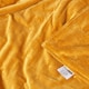 image 6 of Homescapes Mustard Velvet Quilted Throw - 150 x 200 cm Yellow