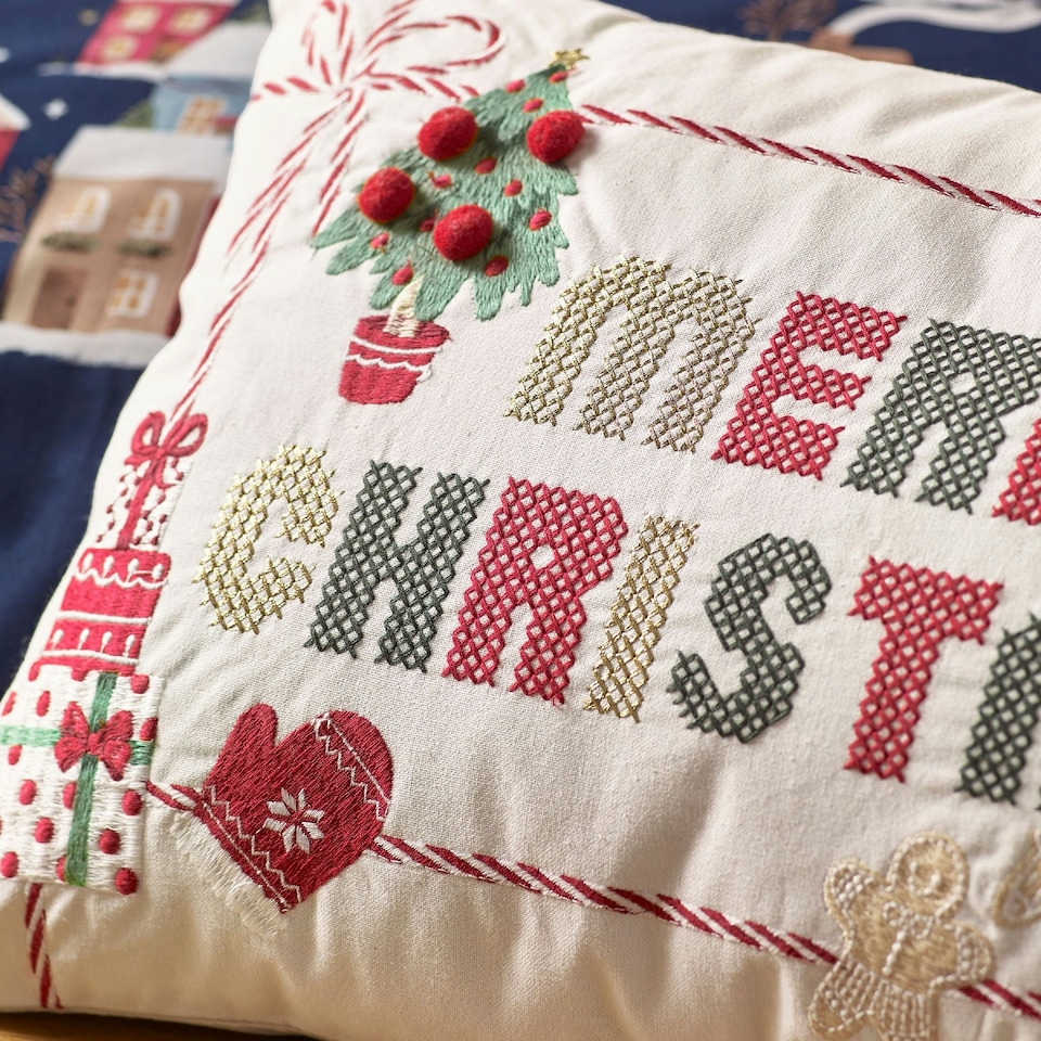 image 1 of Catherine Lansfield Merry Christmas Cross Stitch 30x50cm Cushion Natural Cream | Natural | 30 x 50 cm