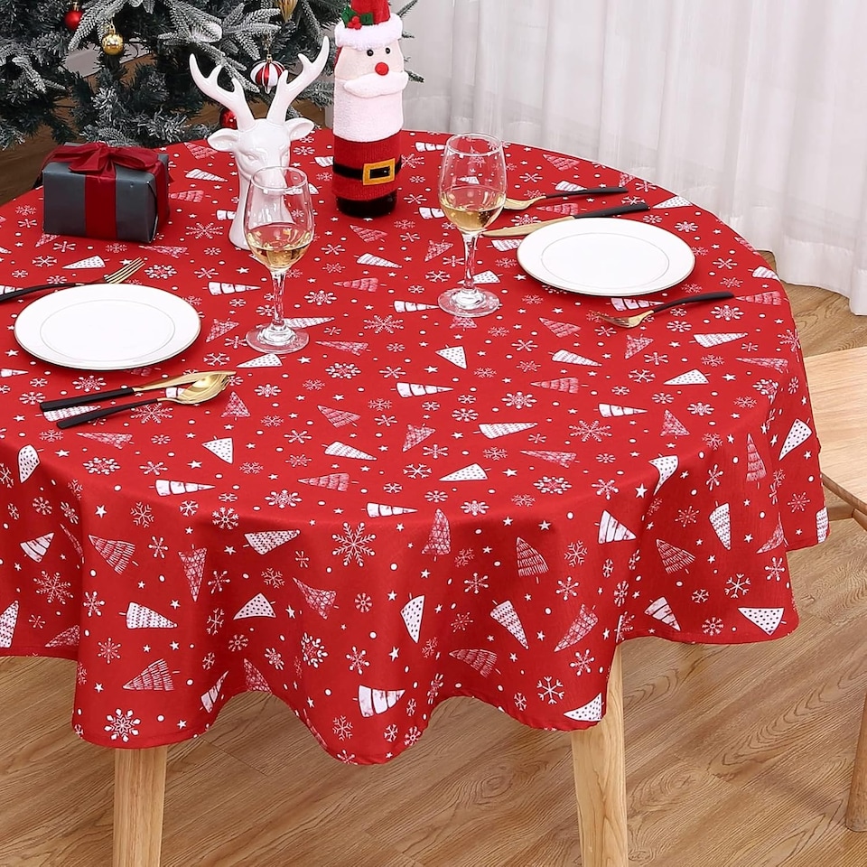 image 1 of London Boutique Round Christmas Tablecloth, Waterproof Wipe‑Clean, Snowflake and Tree Print, Red, 60 in