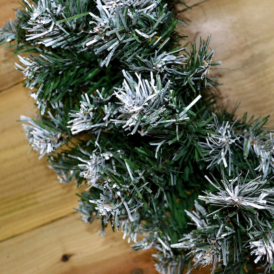 image 1 of 55cm Premier Christmas Snow Tipped Green Pine PVC Door Wreath
