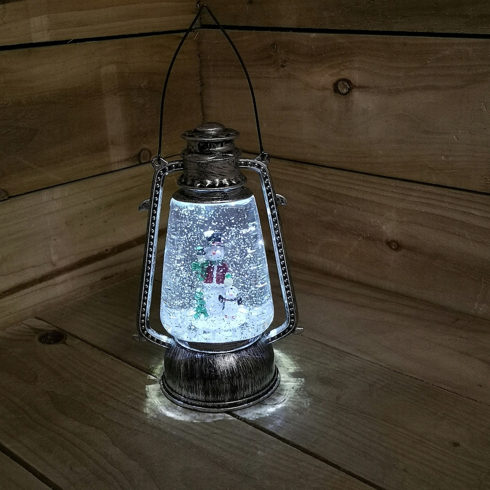 image 1 of 24cm Christmas Water Spinner Antique Silver Effect Hurricane Lantern Style with Snowman & Penguin Scene