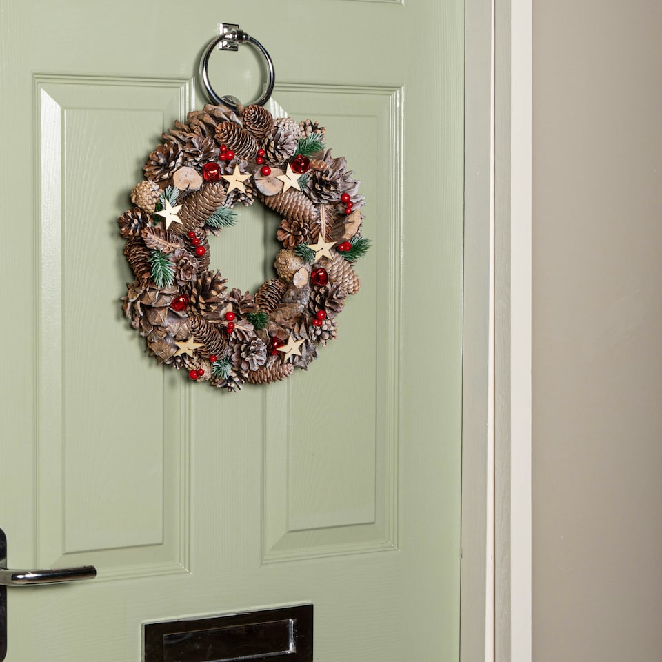 image 1 of 36cm Frosted Hanging Christmas Wreath with Red Jingle Bells & Wooden Stars
