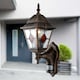 image 5 of Set of 2 Morecambe - Black Brushed Gold PIR Sensor Outdoor Wall Lights | Black | Black & hand brushed gold and clear glass with amber glass detail | Small | 2