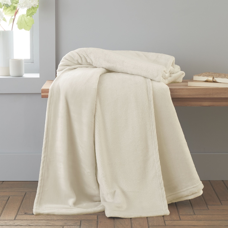 image 1 of Catherine Lansfield Extra Large Raschel Velvet Touch Blanket Throw | Cream