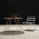 image 4 of Interiors by Premier White Metal and Elm Wood Round Table, Versatile Coffee Table for Home and Office, Round Outdoor Dining Table