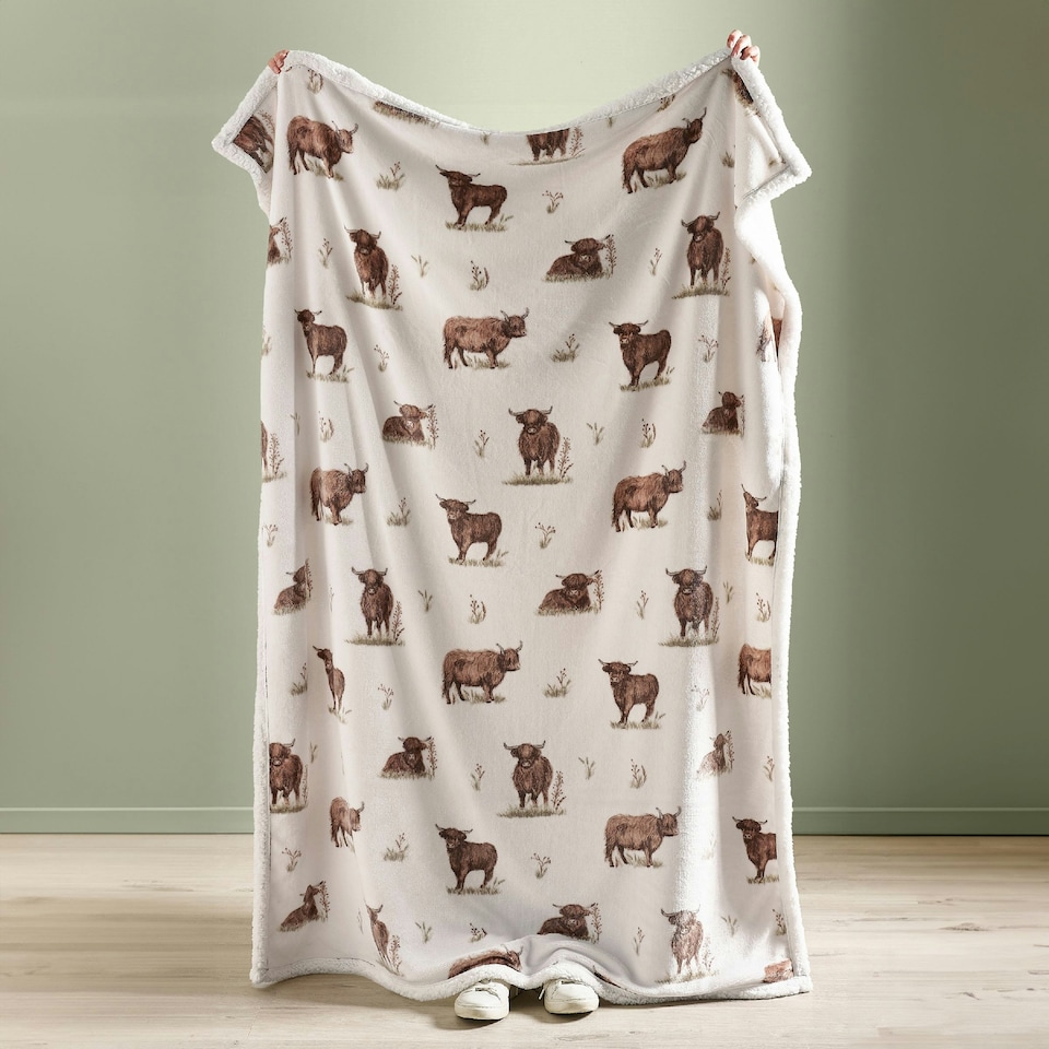 image 1 of Catherine Lansfield Angus Highland Cow Cosy Fleece 130x170cm Blanket Throw Natural | Cream | Natural | One Size