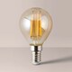 image 2 of ValueLights 6 Pack LED Filament E14 Amber Tinted Golfball Light Bulbs | Clear
