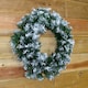 image 8 of 55cm Premier Christmas Snow Tipped Green Pine PVC Door Wreath