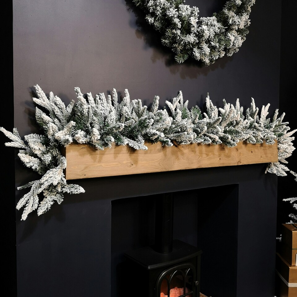 image 1 of 1.8m Snow Flocked Lapland Christmas Garland with 150 Tips
