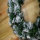 image 7 of 55cm Premier Christmas Snow Tipped Green Pine PVC Door Wreath