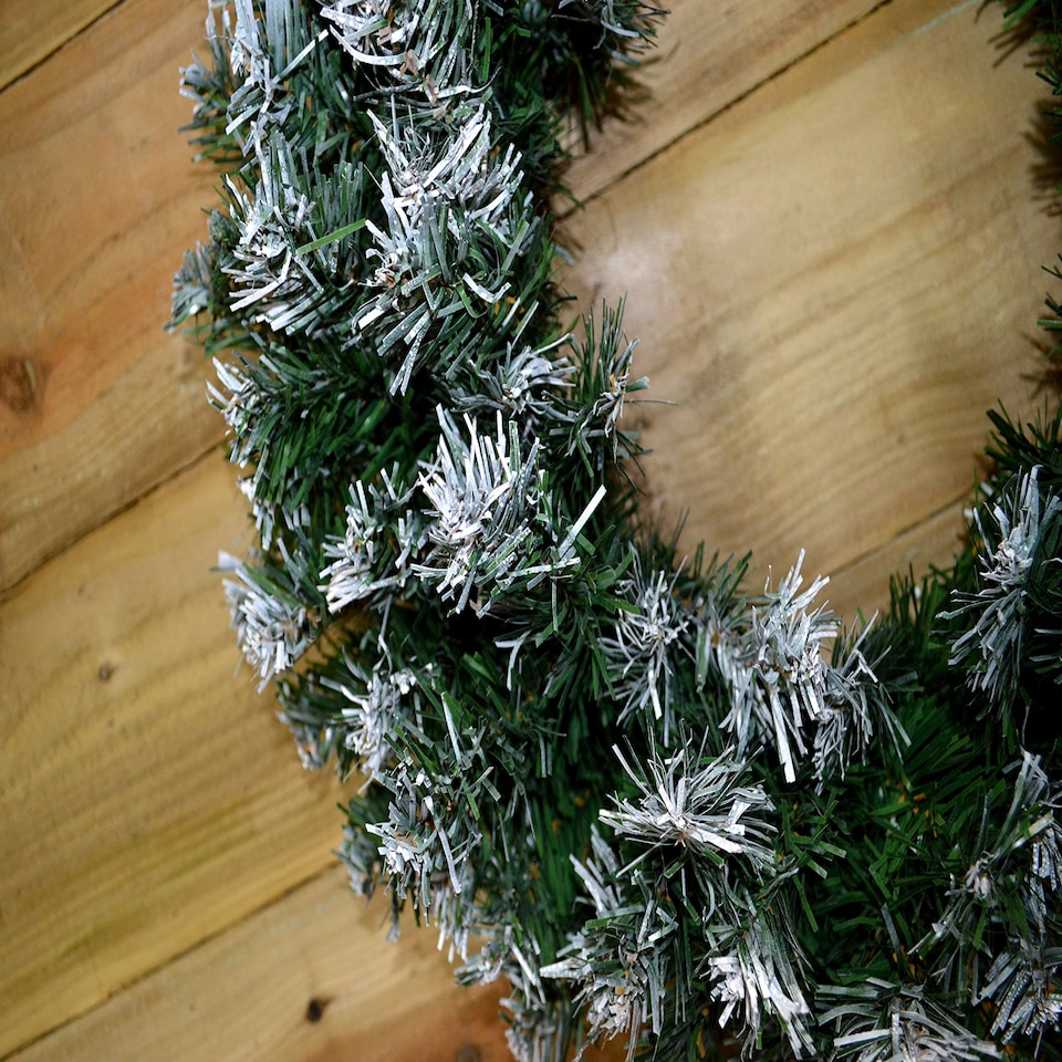 image 1 of 55cm Premier Christmas Snow Tipped Green Pine PVC Door Wreath