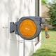 image 5 of Outsunny Retractable Hose Reel Wall Mounted, 302m Garden Hose Pipe Reel with Lock, Auto Rewind, 7 in 1 Spray Nozzle, Includes Wall Fixings, 180 Swivel, Outdoor Watering, 59 x 23 x 42 cm, Orange