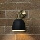 image 1 of ValueLights Antique Brass Adjustable Knuckle Joint Wall Light With Gloss Black Dome Shade