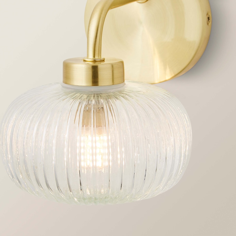 image 1 of ValueLights Amaia Gold IP44 Clear Ribbed Glass Wall Light & Bulbs | Gold