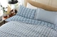image 3 of Small Fish  Cotton Duvet Set with Stripe Reverse & Printed Fabric Bag | Multi | Super King