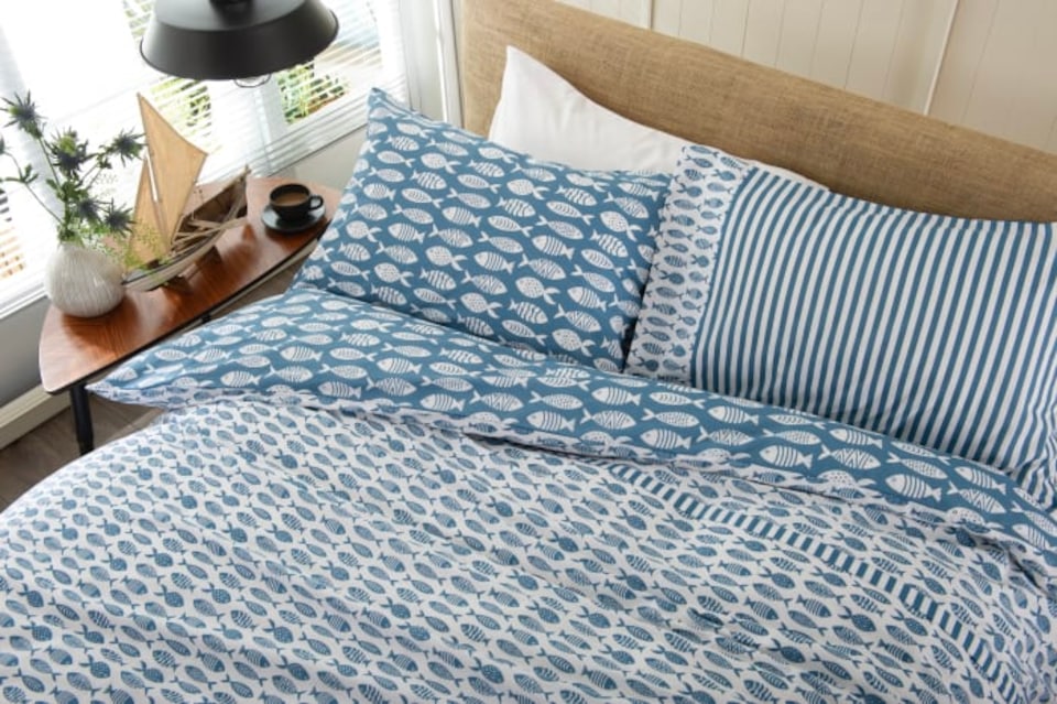 image 1 of Small Fish  Cotton Duvet Set with Stripe Reverse & Printed Fabric Bag | Multi | Super King