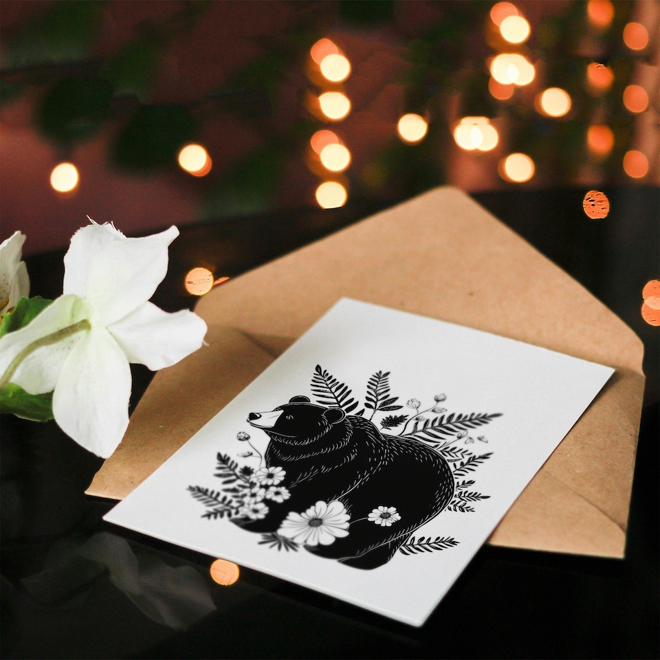 image 1 of Grizzly Bear and Wildflowers Black White Folk Art Birthday Greeting Card