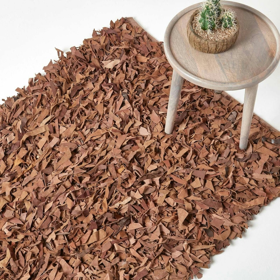 image 1 of Homescapes Dallas Leather Shaggy Rug Brown - 90 x 150 cm | Brown | Brown