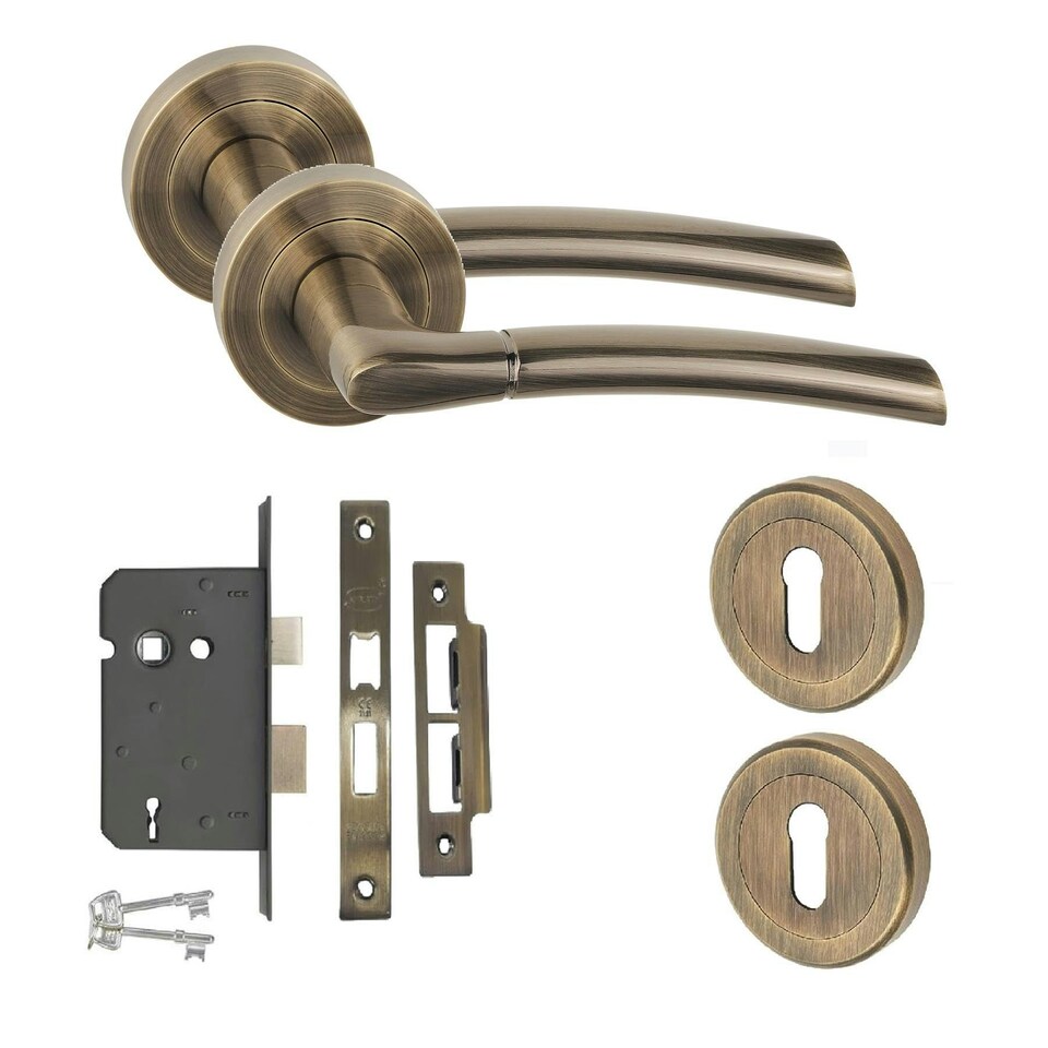 image 1 of Golden Grace Indiana Design Door Handle Set in Antique Brass with Escutcheon and Mortise Lock Bronze
