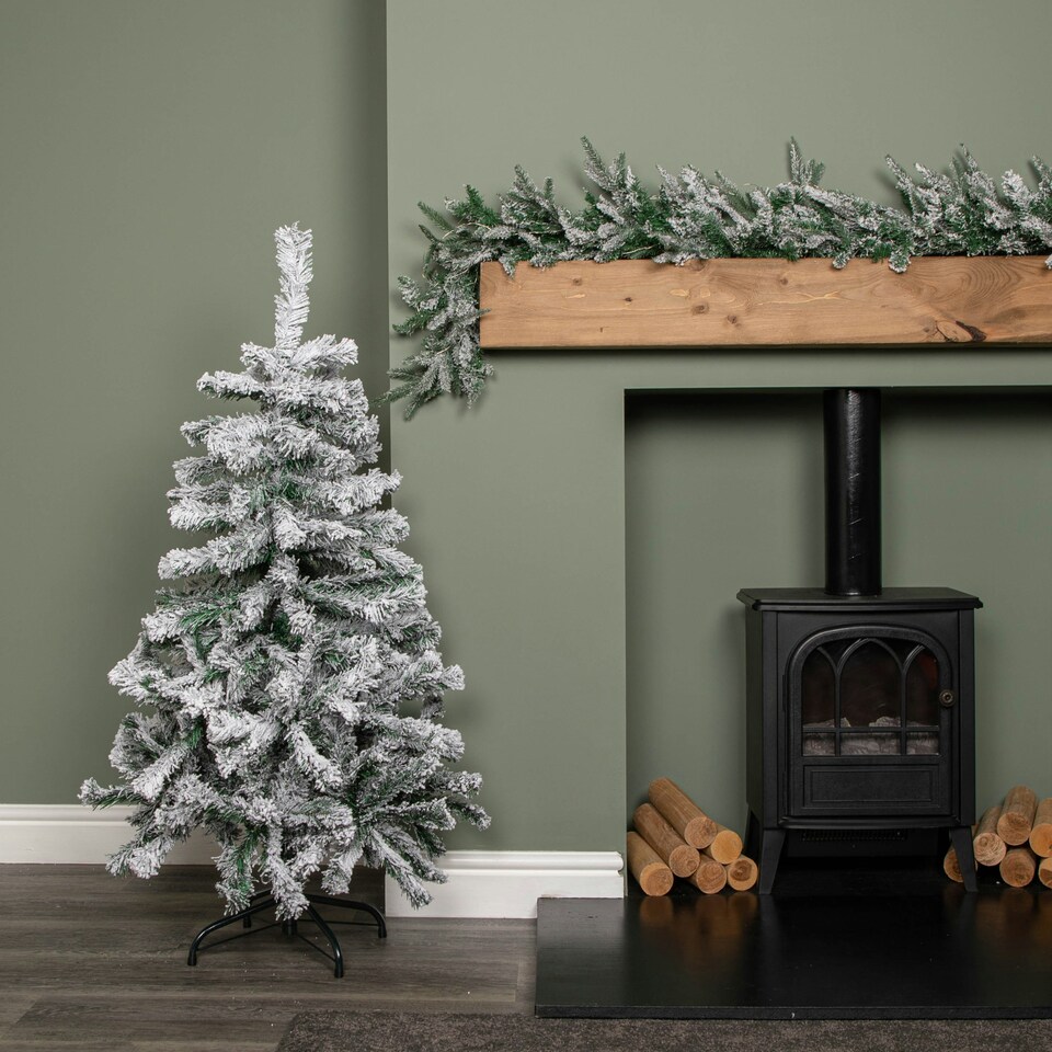image 1 of 4ft (1.2m) Snow Flocked Artificial Christmas Tree with Green Metal Stand and 177 Tips