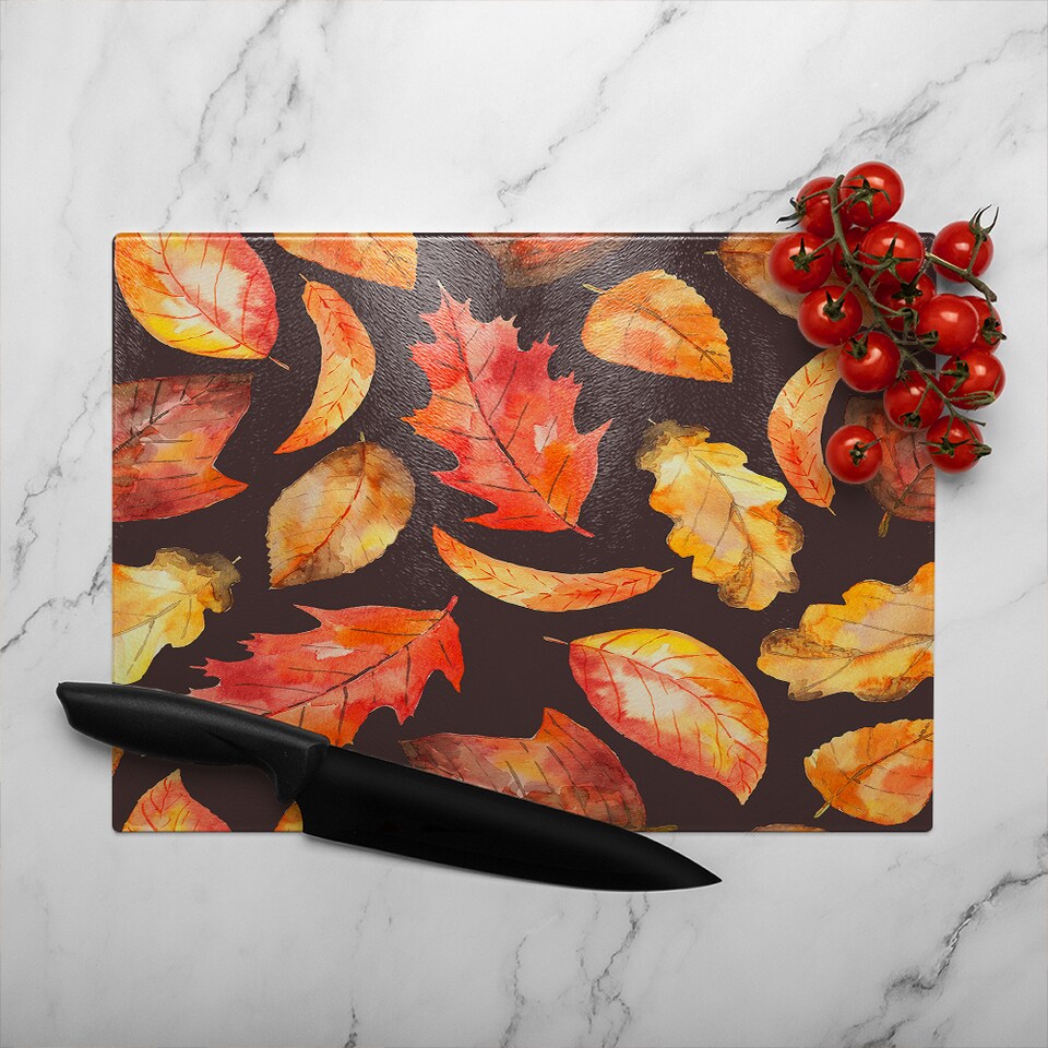 image 1 of Autumn Leaves On Black Glass Chopping Board | Multi