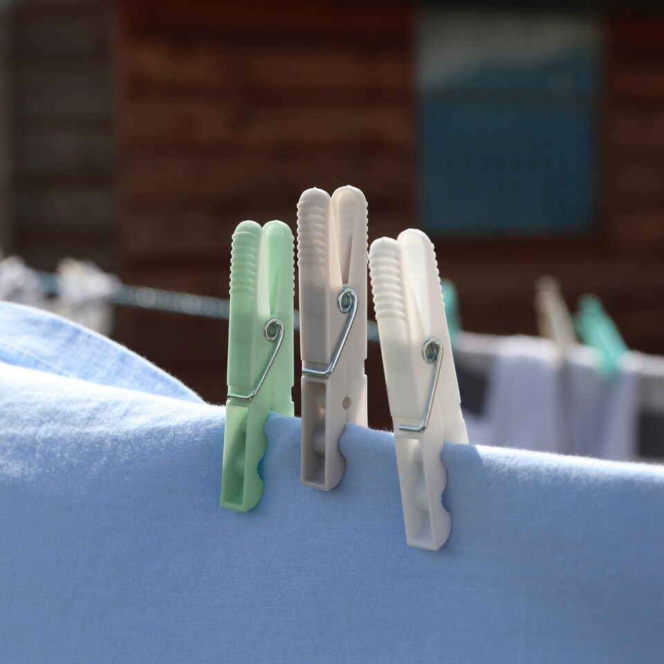 image 1 of JVL Collapsible Peg Basket with 86 Plastic Clothes Pegs, Assorted Colours
