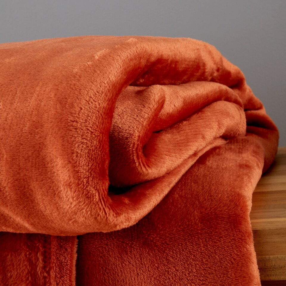 image 1 of Catherine Lansfield Raschel Velvet Touch Blanket Throw | Orange | Burnt Orange