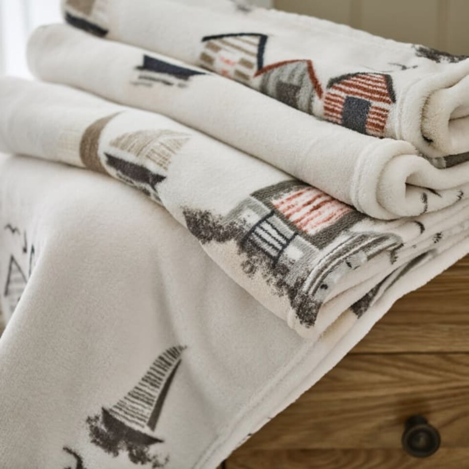 image 1 of Sheringham Soft Coral Fleece Printed Throw
