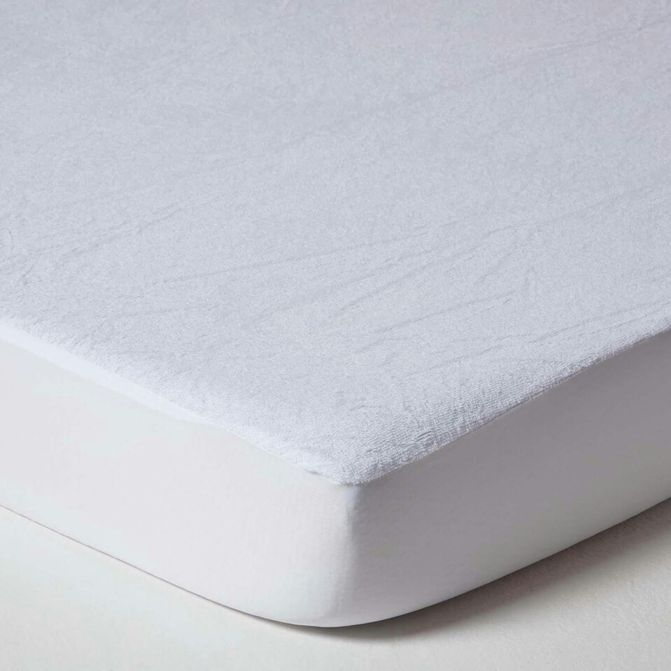 image 1 of Homescapes Cot Bed Terry Towelling Waterproof Mattress Protector - 60 x 120 cm - Pack of 2 | White | Cot Bed